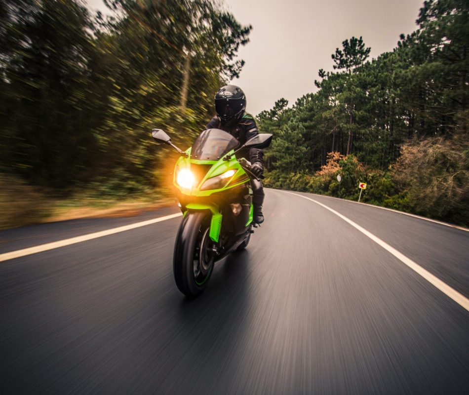 driving-green-neon-color-motorcycle-road-dusk-time